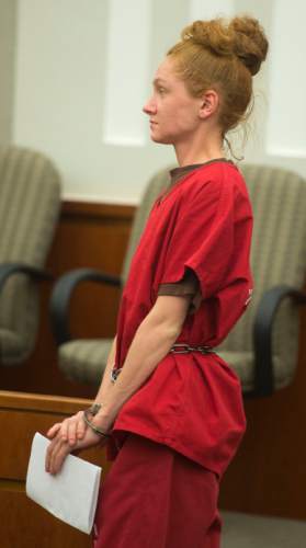 Steve Griffin  |  The Salt Lake Tribune

Jasmine Ruth Bridgeman, who is charged with second-degree felony obstructing justice for allegedly lying to police during the homicide investigation of her 2-year-old son, James Sieger Jr., is led into the courtroom of Judge John R. Morris in 2nd District Court in Farmington, Monday, June 1, 2015.